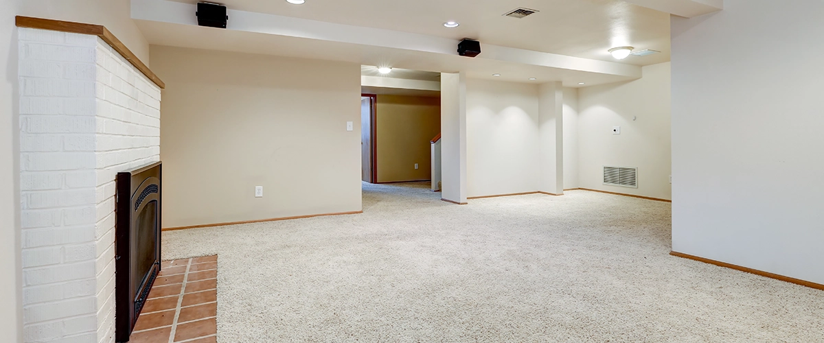 Grey tile flooring basement finishing in New Castle, DE